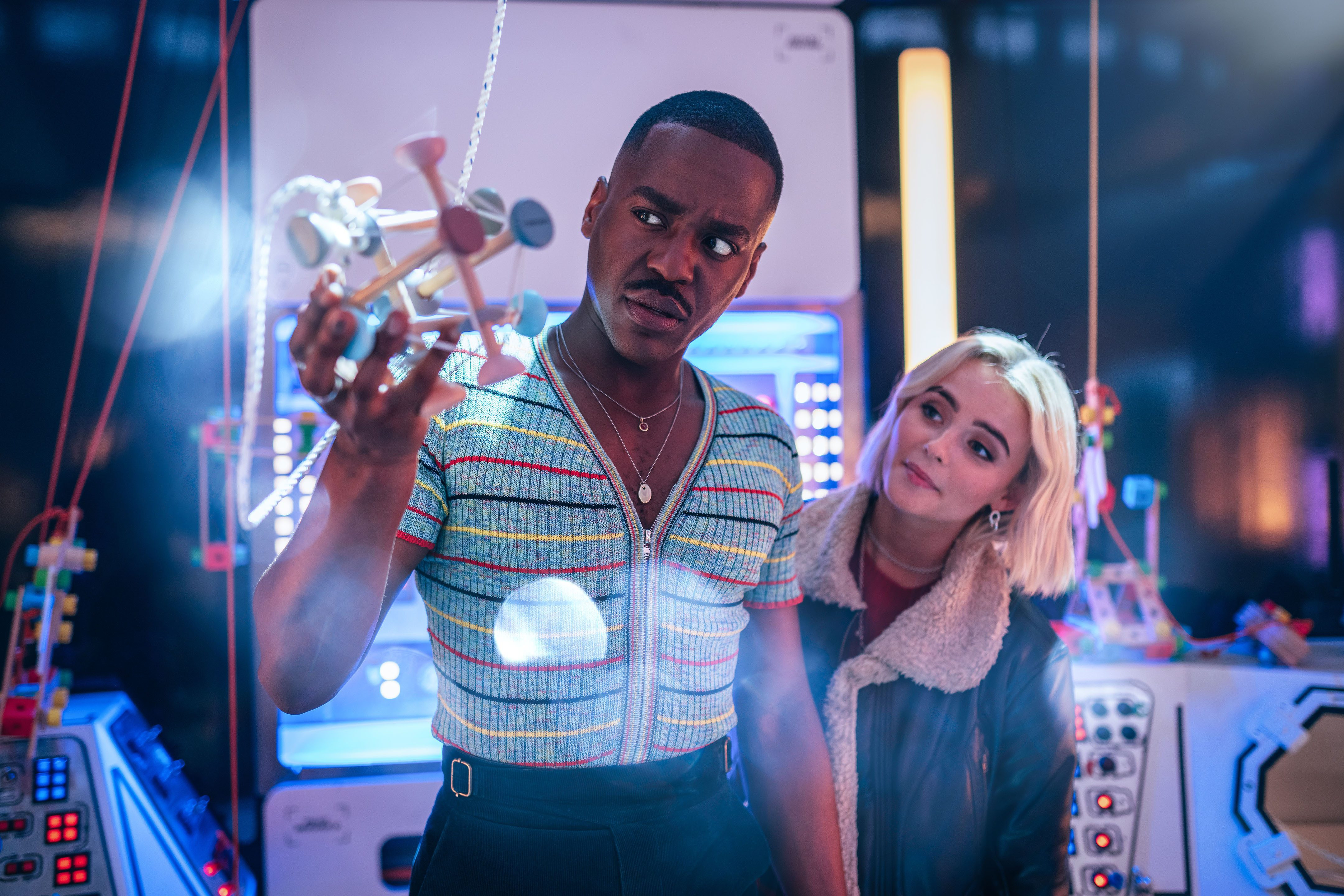 Ncuti Gatwa and Millie Gibson in Doctor Who season 14 in the TARDIS looking at a strange contraption