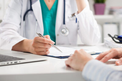 Doctor discussing insurance options with patient at Loma Linda Fertility Clinic