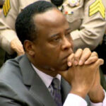 Conrad Murray listens as he sits in court during his sentencing for the involuntary manslaughter of singer Michael Jackson