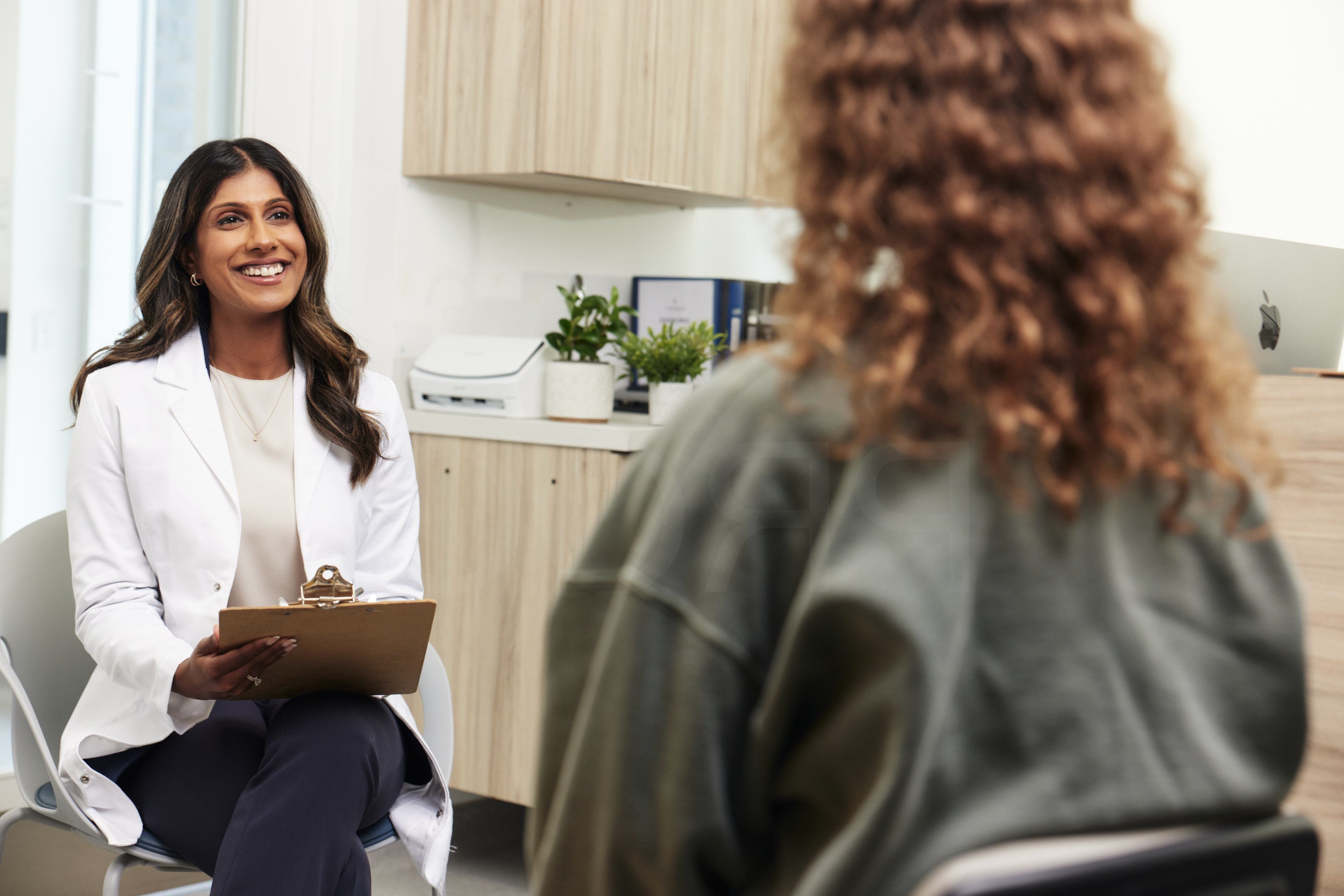 Pediatrician examining a child